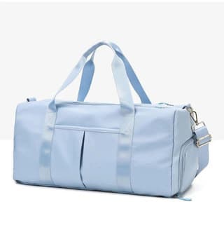 Light blue travel duffel bag with carry handles and an adjustable shoulder strap